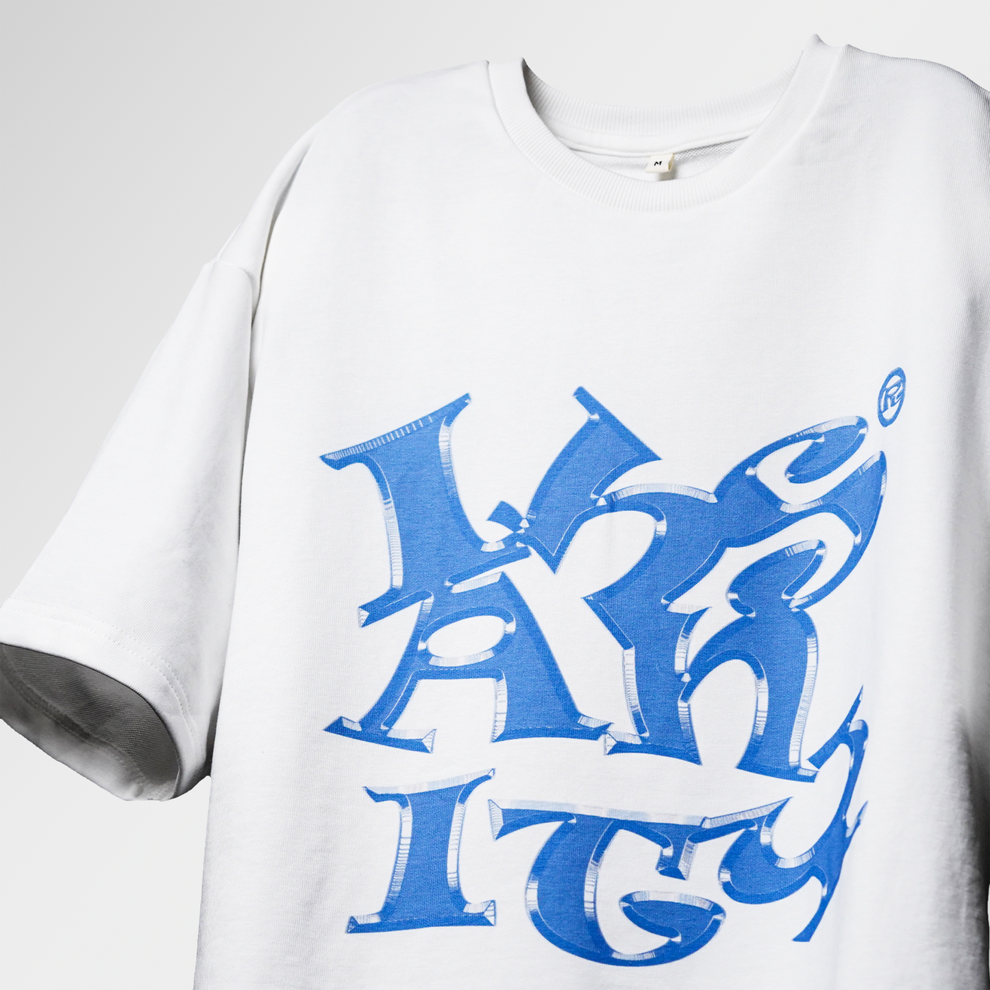 floating tshirt in studio background with blue text design "insanity" on the front side of the tshirt